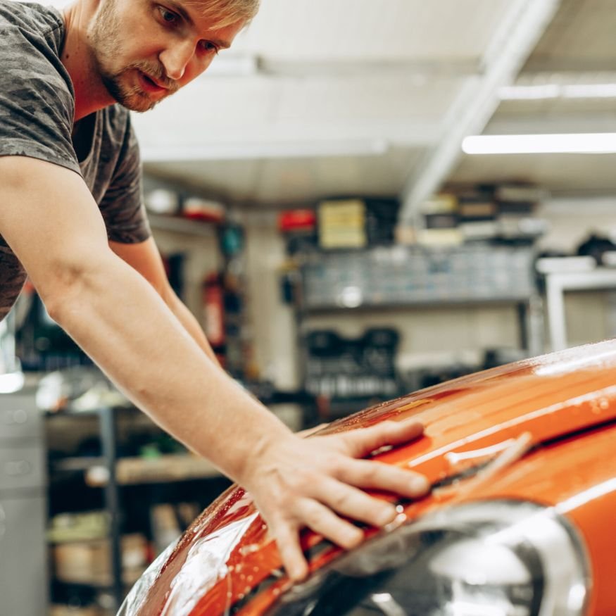 Car wrapping with foil at car service